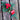 hand made holly cross with red bow and flowers