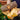 Loose kiln dried logs being held in hands