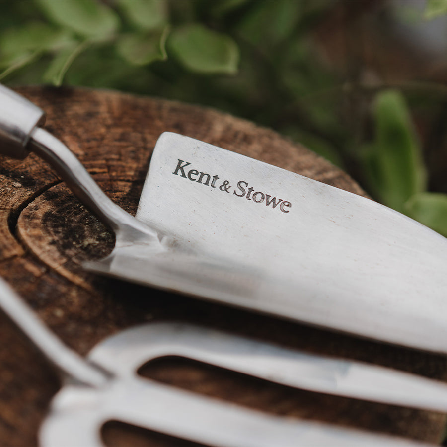 close up of a kent and stowe stainless steel hand trowel